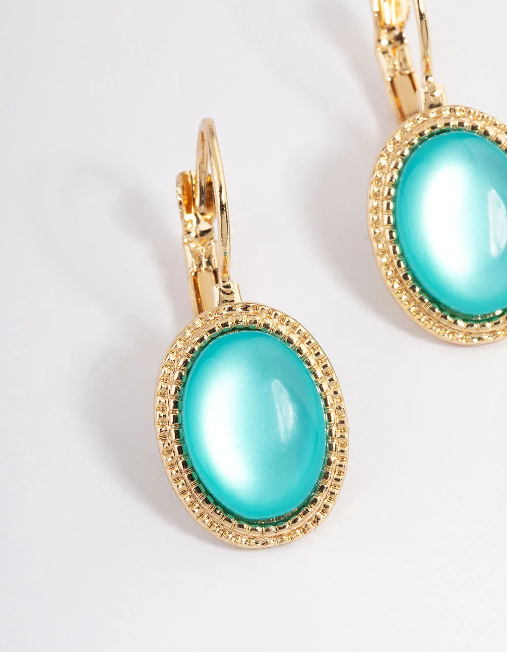 Gold Oval Huggie Earrings