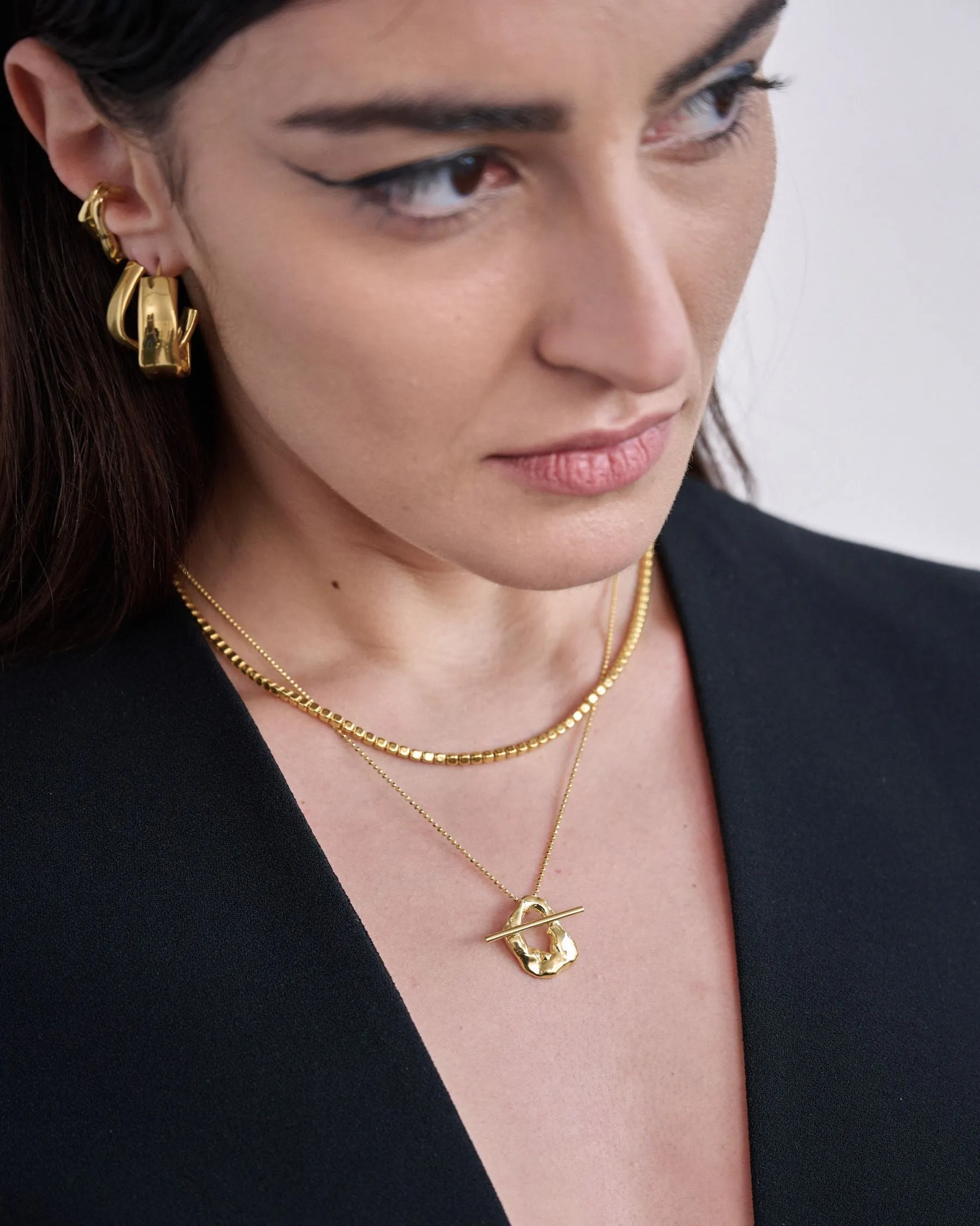 Thelia Gold Pendant